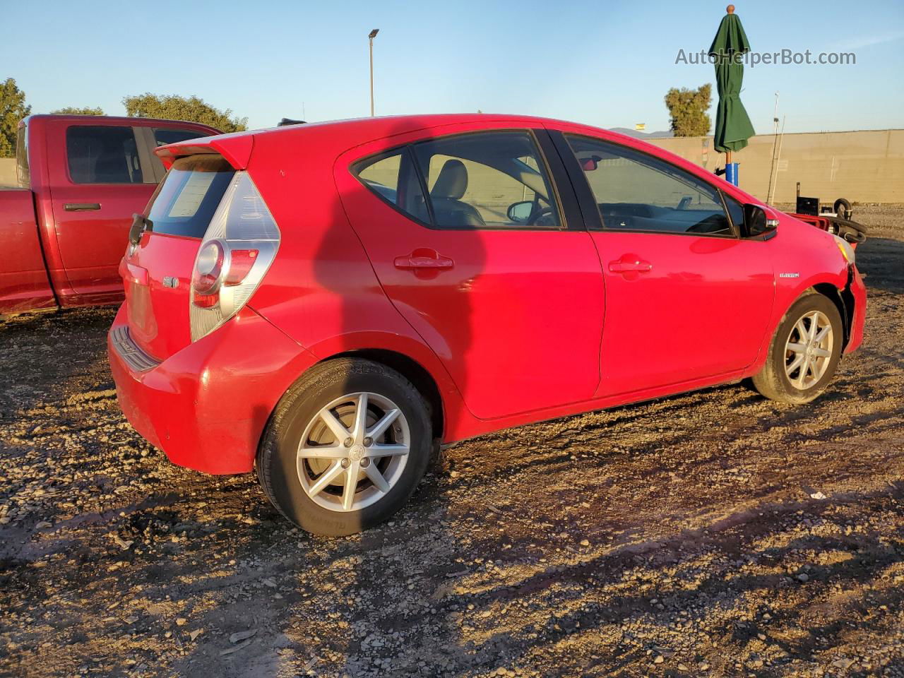 2012 Toyota Prius C  Red vin: JTDKDTB35C1025156