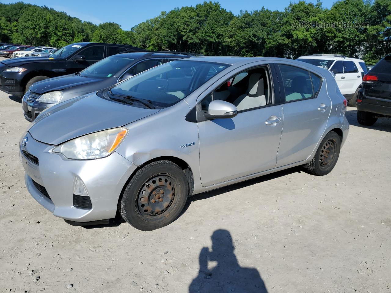 2012 Toyota Prius C  Серебряный vin: JTDKDTB35C1027523