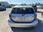 2012 Toyota Prius C  Серебряный vin: JTDKDTB35C1027523