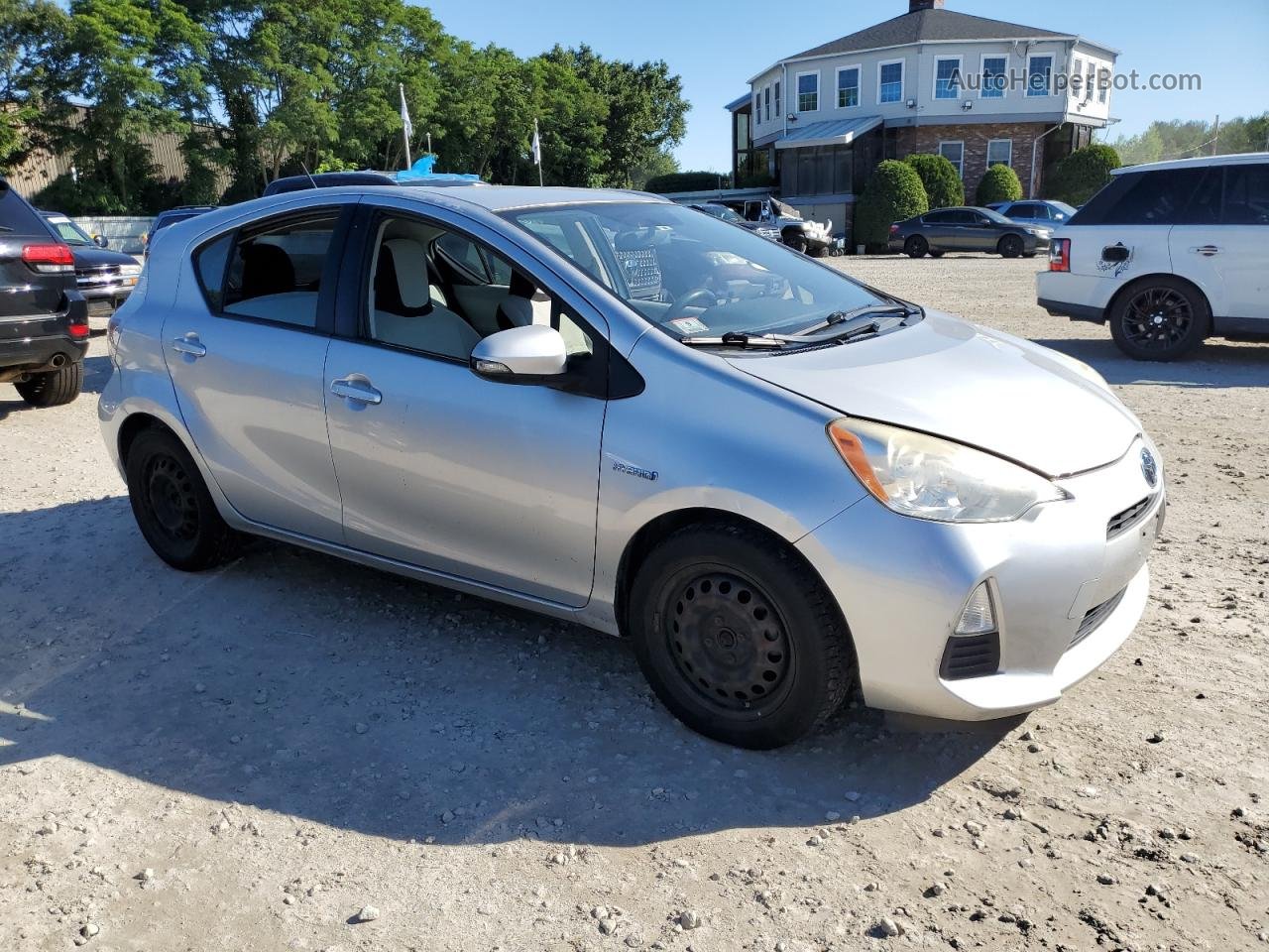 2012 Toyota Prius C  Серебряный vin: JTDKDTB35C1027523