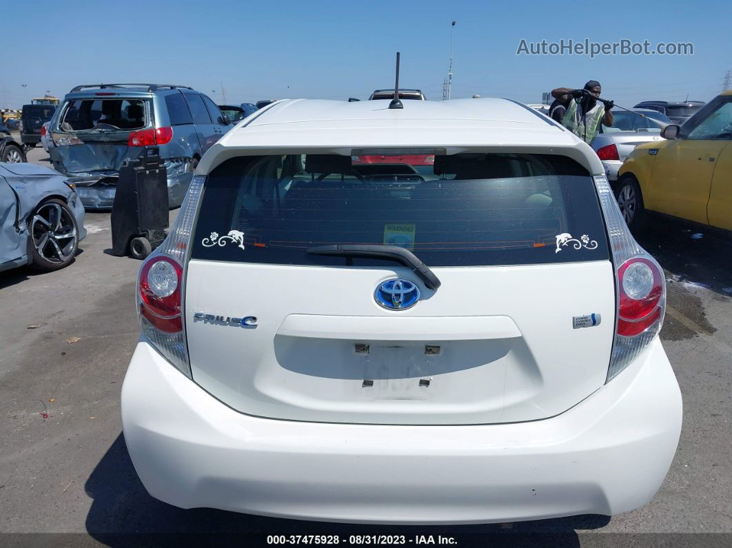 2014 Toyota Prius C One/three/two/four White vin: JTDKDTB35E1060329