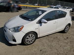 2014 Toyota Prius C  White vin: JTDKDTB35E1068379