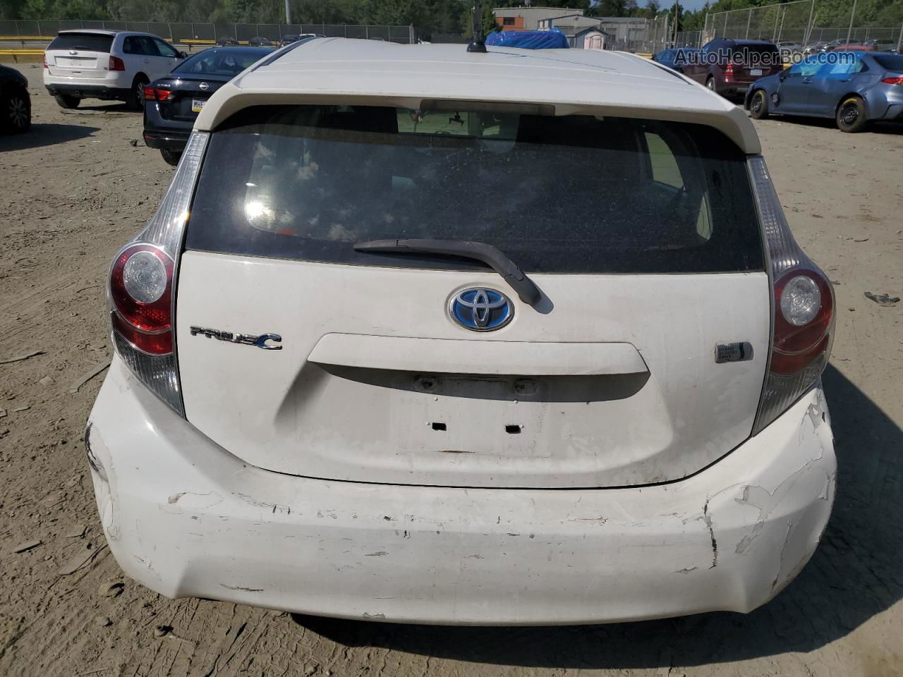 2014 Toyota Prius C  White vin: JTDKDTB35E1068379