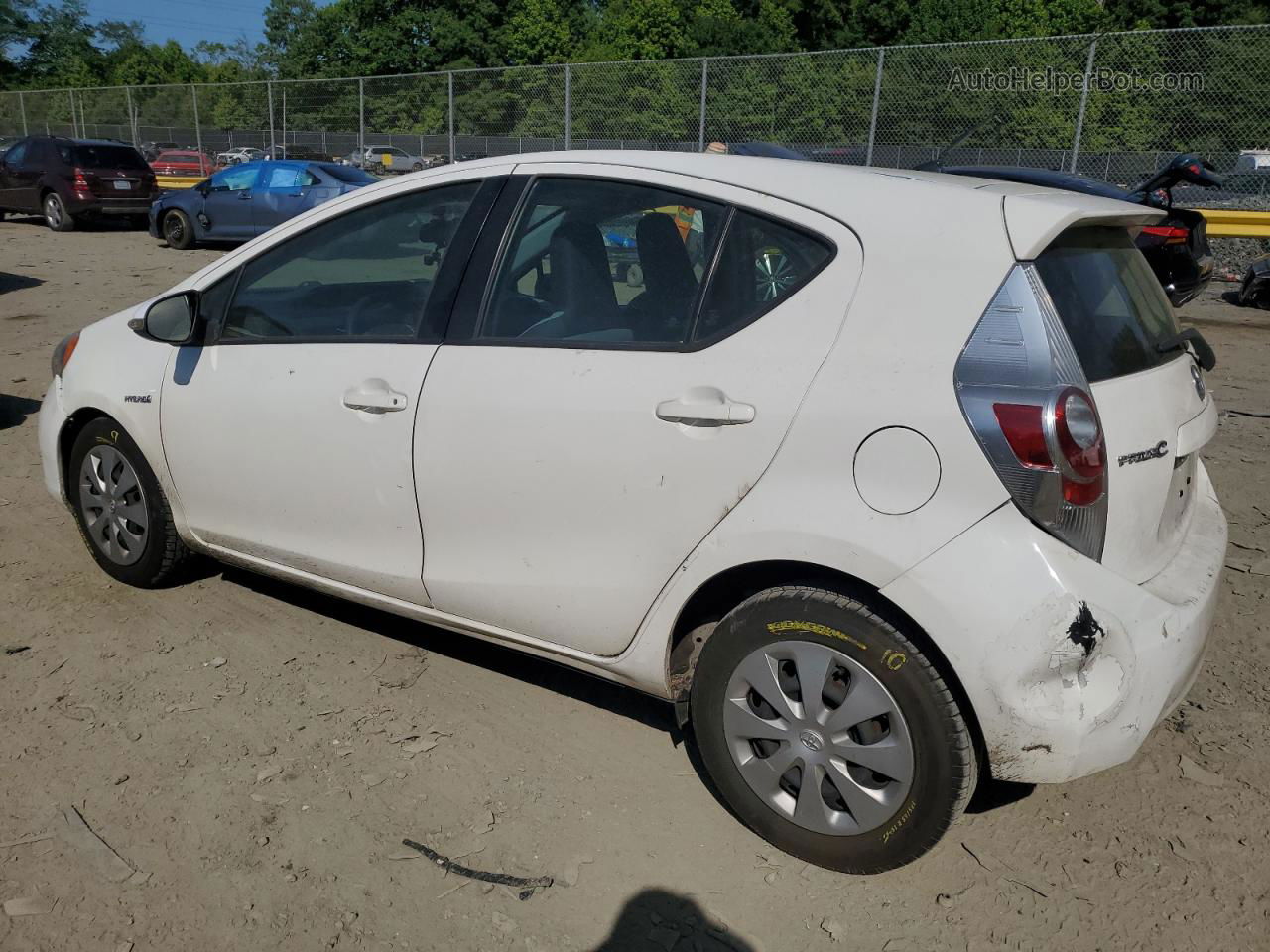 2014 Toyota Prius C  White vin: JTDKDTB35E1068379