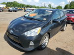 2014 Toyota Prius C  Black vin: JTDKDTB35E1075459