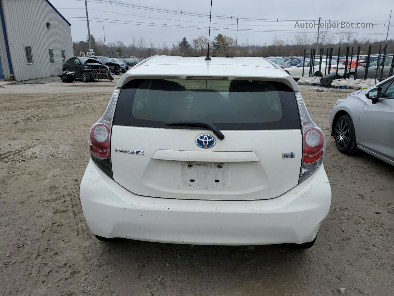 2014 Toyota Prius C  White vin: JTDKDTB35E1077566