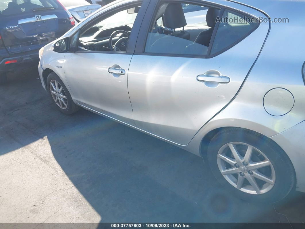 2014 Toyota Prius C One/three/two/four Серебряный vin: JTDKDTB35E1078782