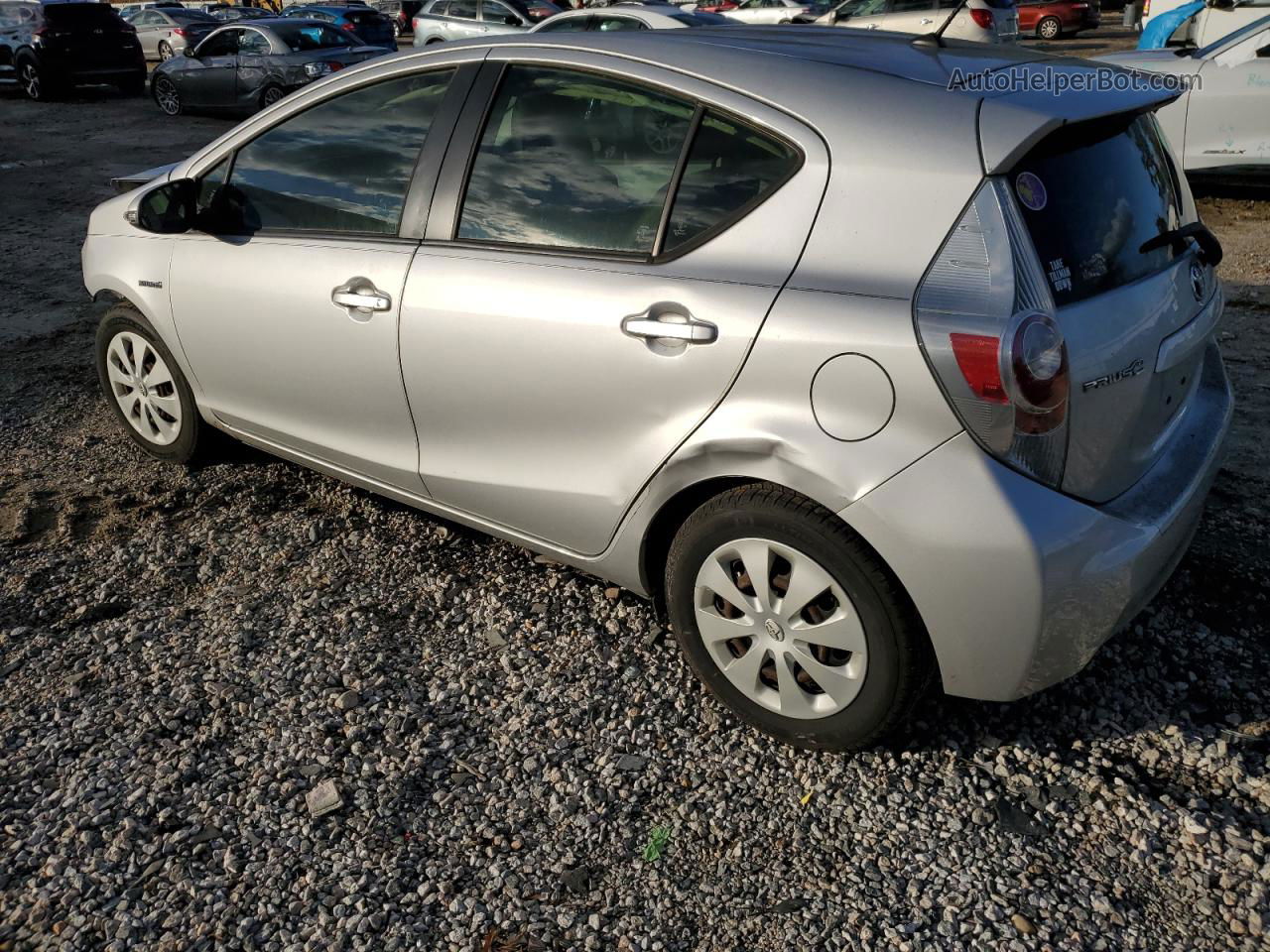 2013 Toyota Prius C  Серебряный vin: JTDKDTB36D1058569