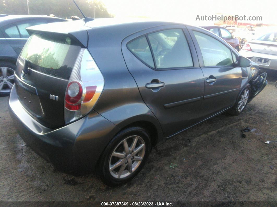 2014 Toyota Prius C One/three/two/four Серебряный vin: JTDKDTB36E1071808