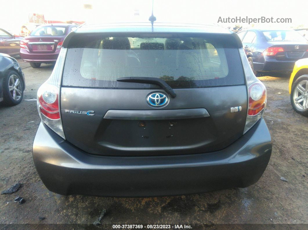 2014 Toyota Prius C One/three/two/four Серебряный vin: JTDKDTB36E1071808