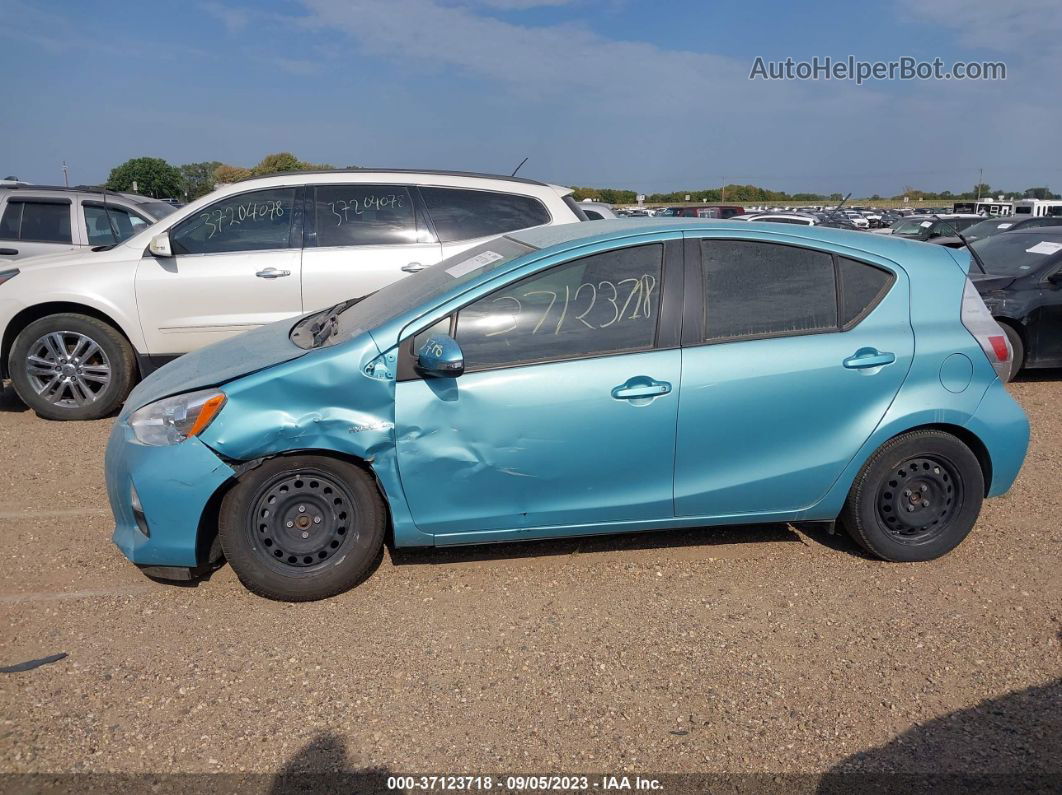 2014 Toyota Prius C One/three/two/four Teal vin: JTDKDTB36E1083151