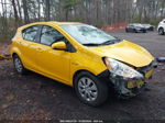 2014 Toyota Prius C Two Yellow vin: JTDKDTB36E1083201