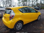 2014 Toyota Prius C Two Yellow vin: JTDKDTB36E1083201