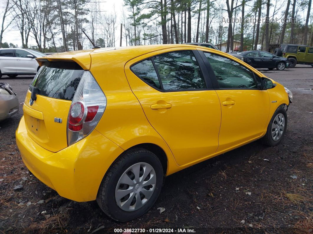 2014 Toyota Prius C Two Yellow vin: JTDKDTB36E1083201