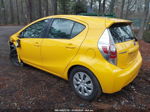 2014 Toyota Prius C Two Yellow vin: JTDKDTB36E1083201