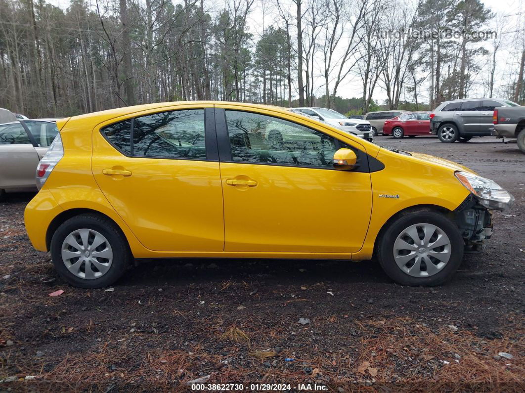 2014 Toyota Prius C Two Yellow vin: JTDKDTB36E1083201