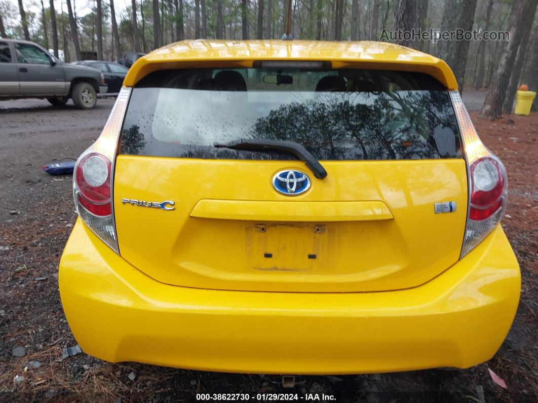 2014 Toyota Prius C Two Yellow vin: JTDKDTB36E1083201