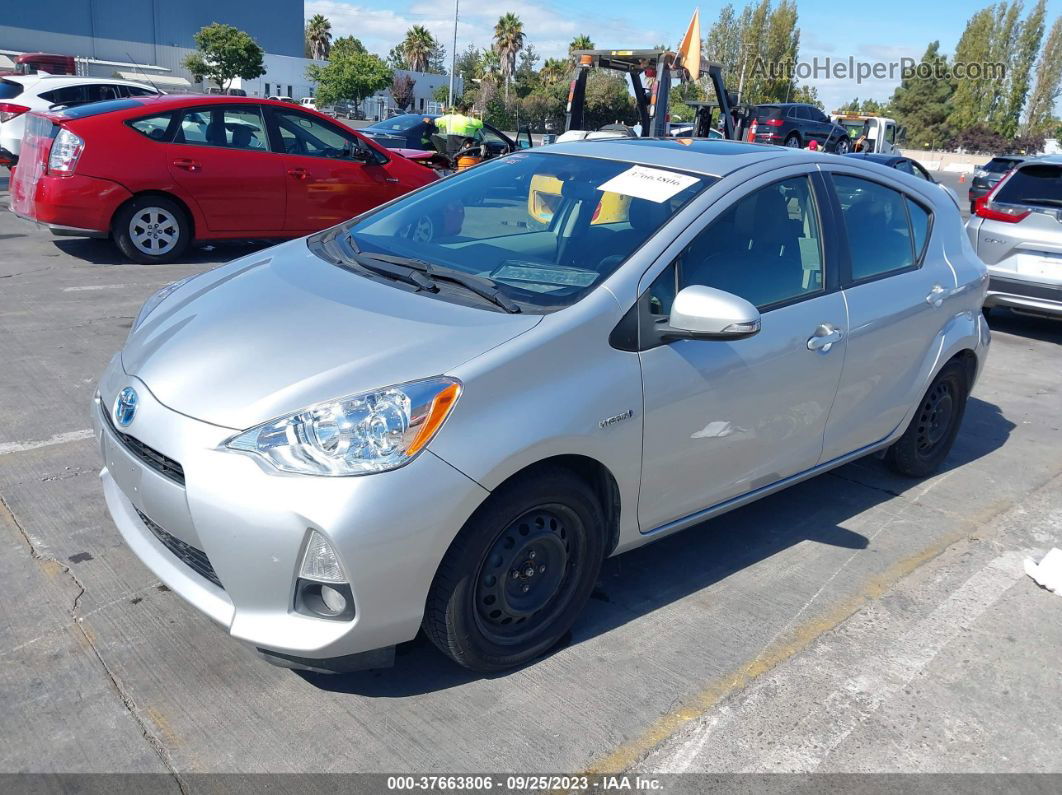 2014 Toyota Prius C One/three/two/four Silver vin: JTDKDTB36E1083215