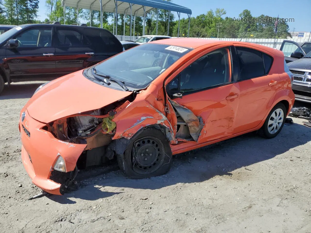 2012 Toyota Prius C  Orange vin: JTDKDTB37C1005393