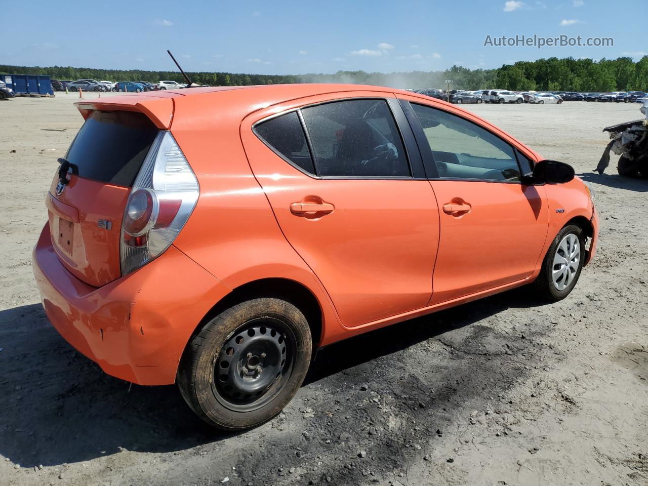 2012 Toyota Prius C  Оранжевый vin: JTDKDTB37C1005393