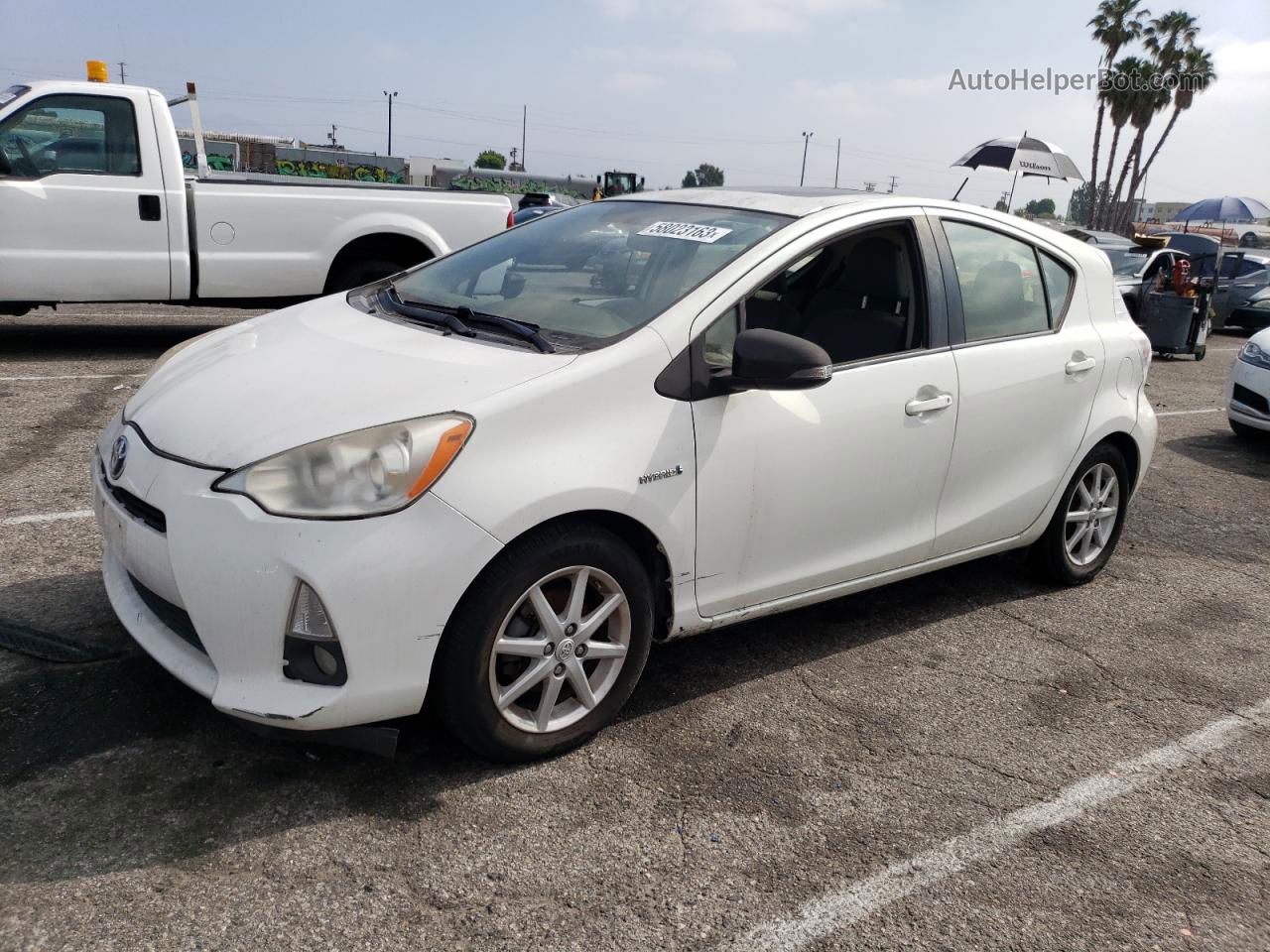 2012 Toyota Prius C  White vin: JTDKDTB37C1012554