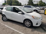 2012 Toyota Prius C  White vin: JTDKDTB37C1012554