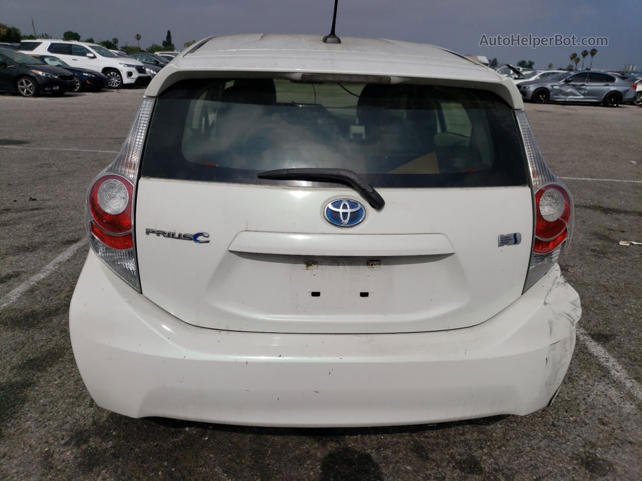 2012 Toyota Prius C  White vin: JTDKDTB37C1012554