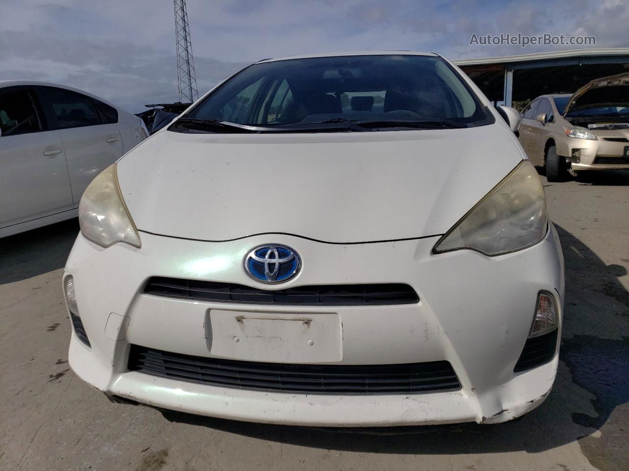 2012 Toyota Prius C  White vin: JTDKDTB37C1028625