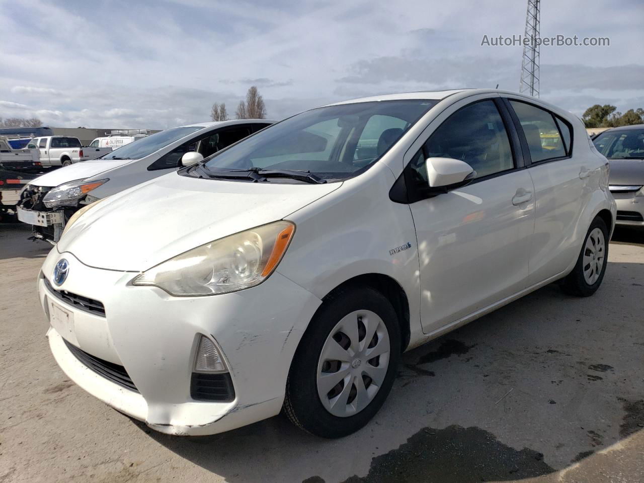 2012 Toyota Prius C  White vin: JTDKDTB37C1028625