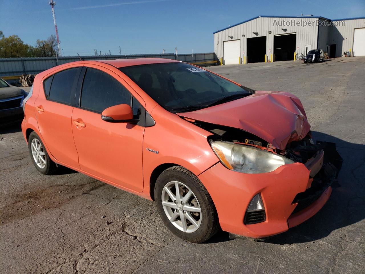 2012 Toyota Prius C  Orange vin: JTDKDTB37C1029631