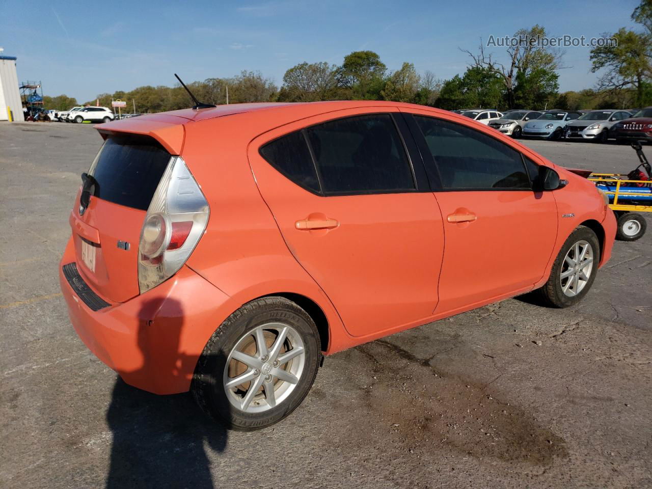 2012 Toyota Prius C  Оранжевый vin: JTDKDTB37C1029631