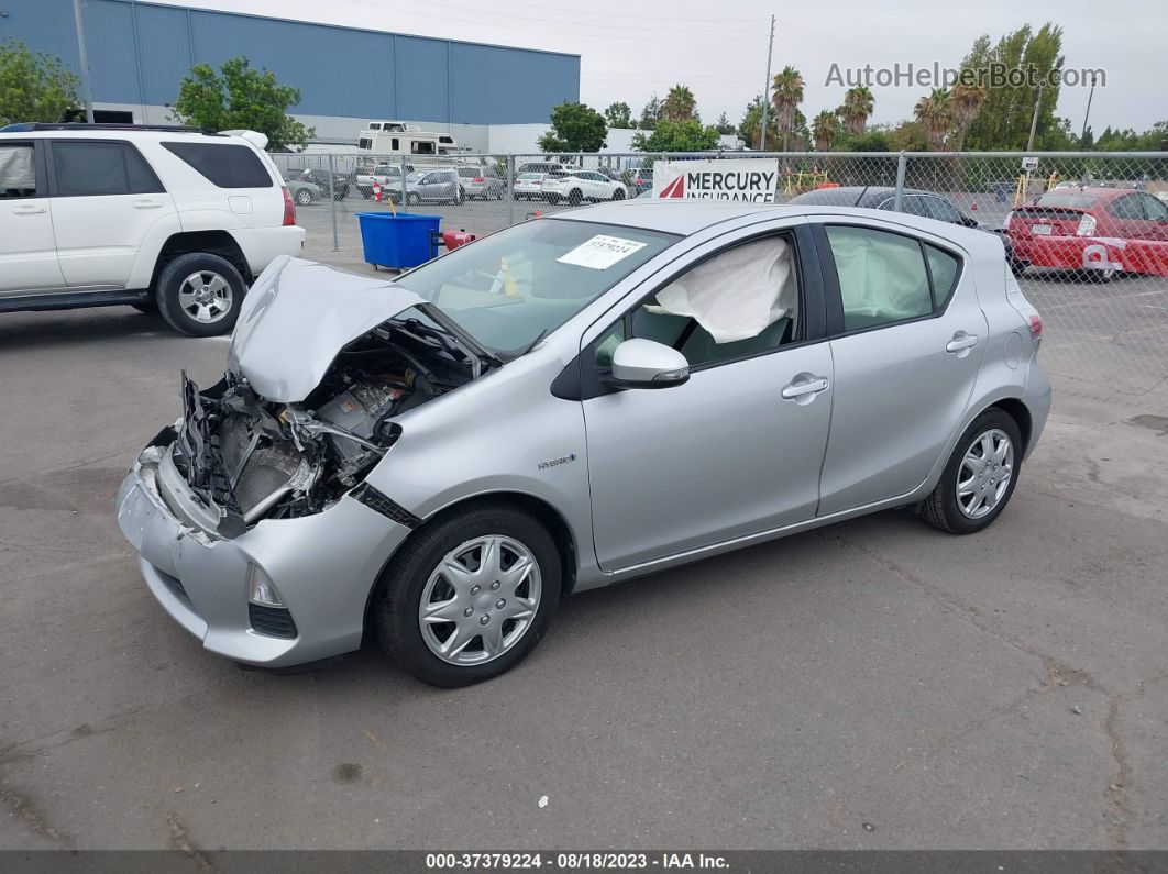 2014 Toyota Prius C One/three/two/four Серебряный vin: JTDKDTB37E1059408