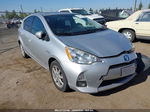 2014 Toyota Prius C One/three/two/four Серебряный vin: JTDKDTB37E1075270