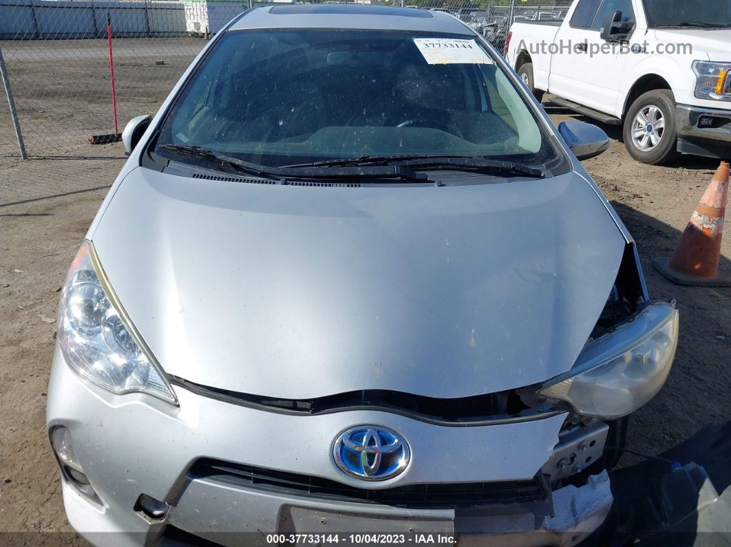 2014 Toyota Prius C One/three/two/four Серебряный vin: JTDKDTB37E1075270