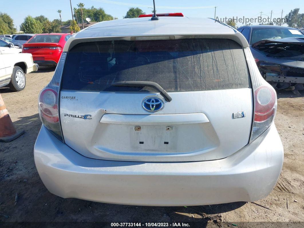 2014 Toyota Prius C One/three/two/four Серебряный vin: JTDKDTB37E1075270