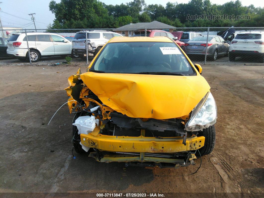 2014 Toyota Prius C One/three/two/four Yellow vin: JTDKDTB37E1078265