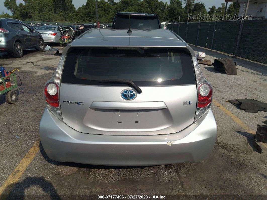 2014 Toyota Prius C One/three/two/four Серебряный vin: JTDKDTB37E1078718