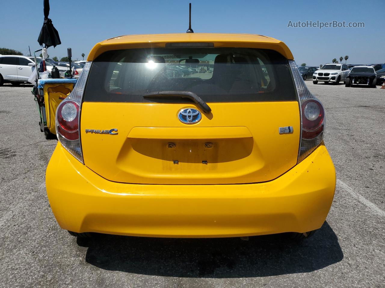 2014 Toyota Prius C  Yellow vin: JTDKDTB38E1060003