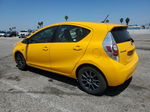 2014 Toyota Prius C  Yellow vin: JTDKDTB38E1060003