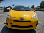 2014 Toyota Prius C  Yellow vin: JTDKDTB38E1060003