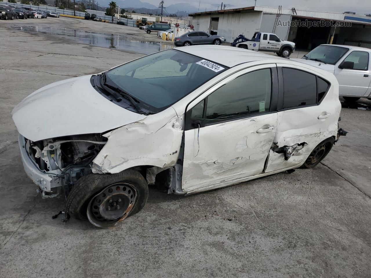 2014 Toyota Prius C  White vin: JTDKDTB38E1558363