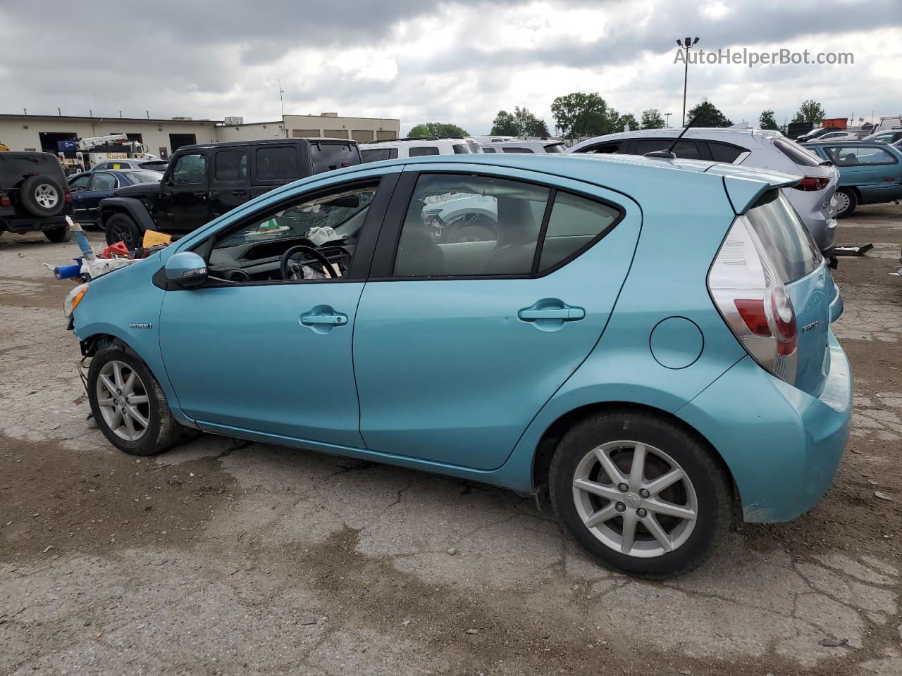 2014 Toyota Prius C  Blue vin: JTDKDTB39E1065999