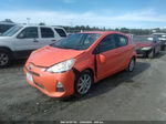 2014 Toyota Prius C Three Оранжевый vin: JTDKDTB39E1069180