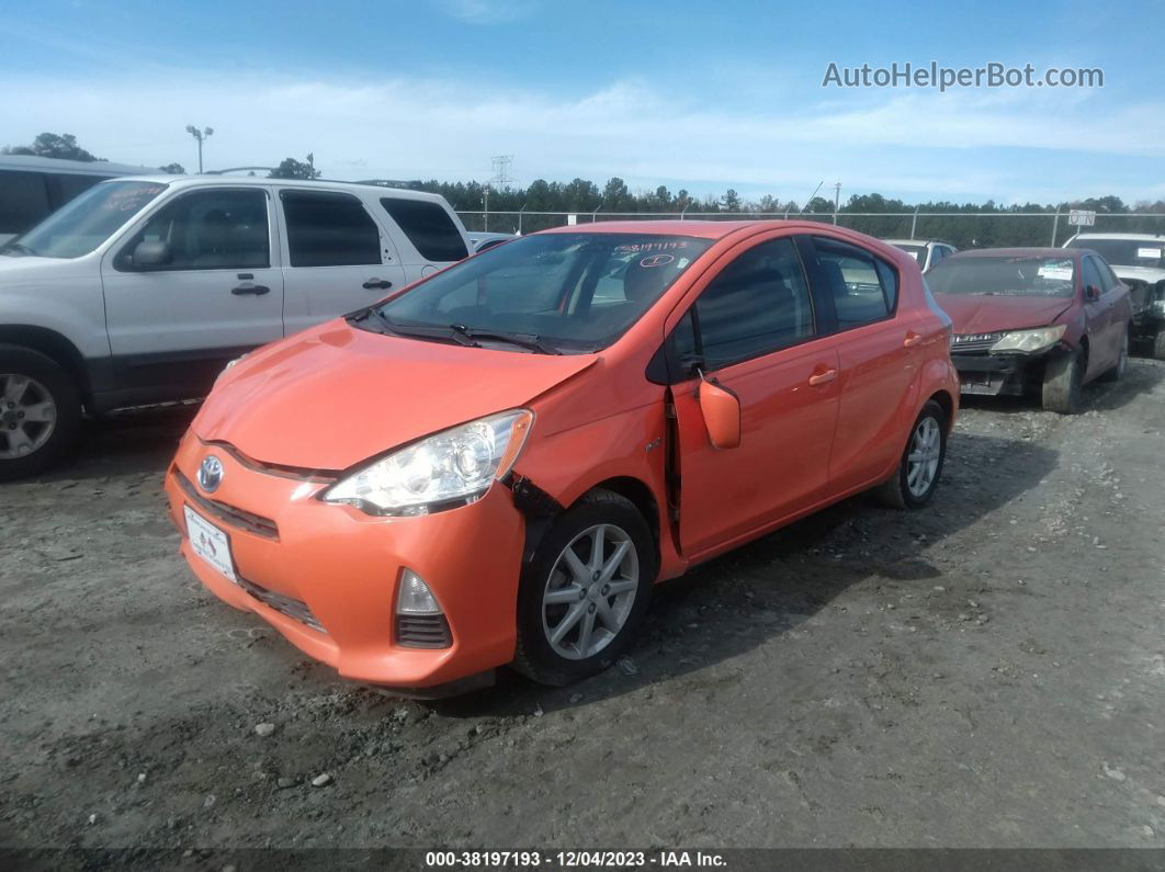 2014 Toyota Prius C Three Orange vin: JTDKDTB39E1069180