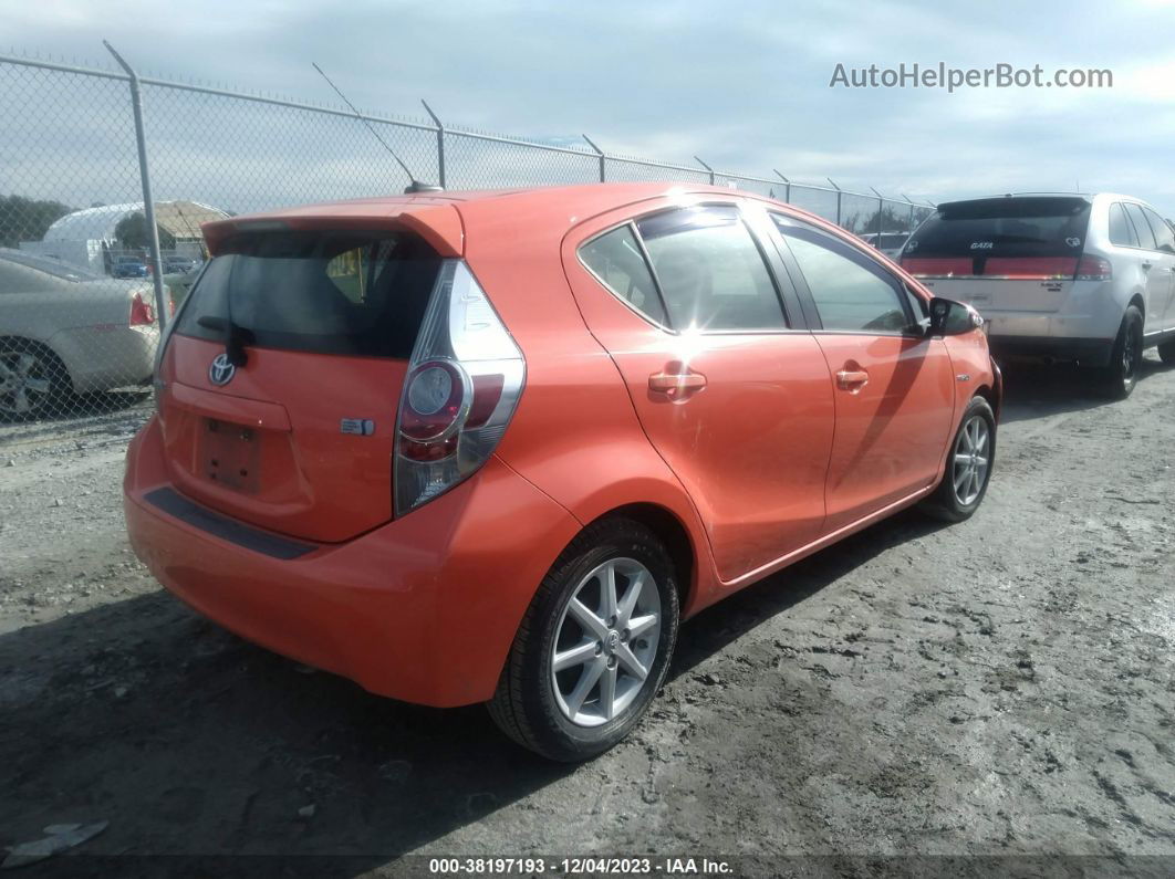 2014 Toyota Prius C Three Orange vin: JTDKDTB39E1069180