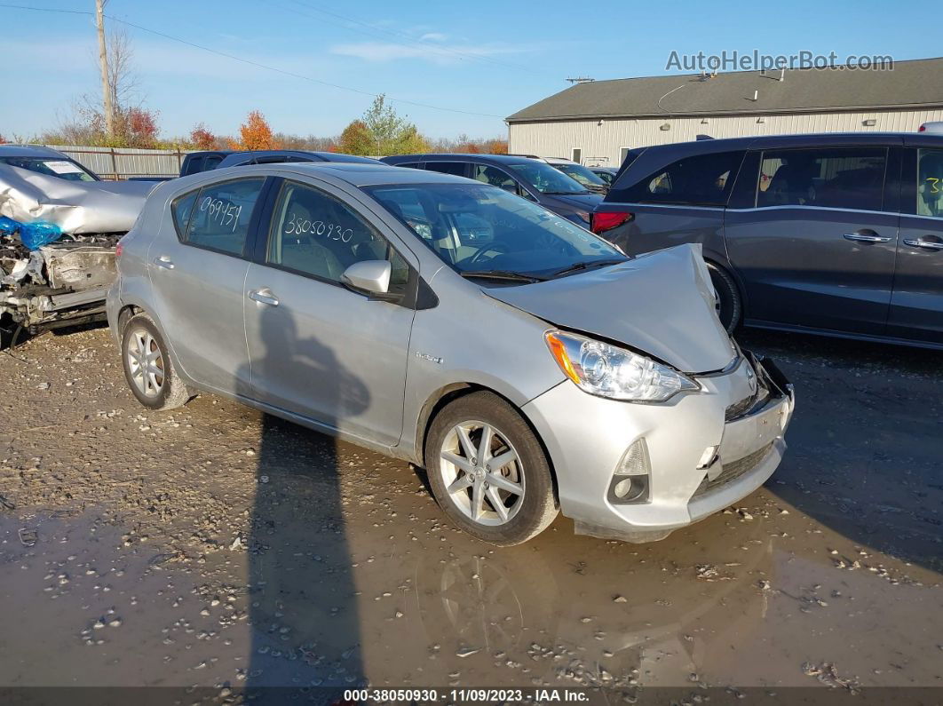 2014 Toyota Prius C One/three/two/four Silver vin: JTDKDTB39E1069454