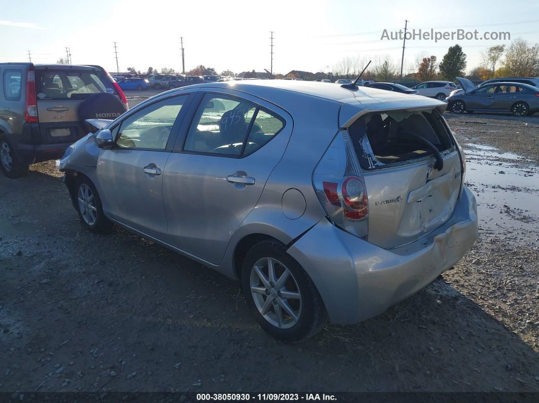 2014 Toyota Prius C One/three/two/four Silver vin: JTDKDTB39E1069454