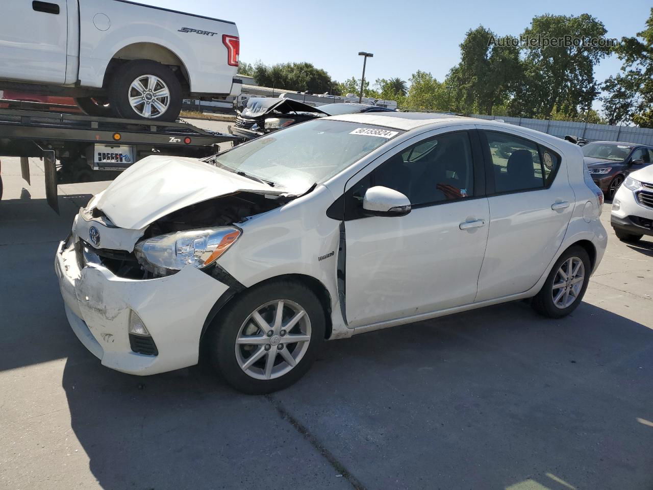 2014 Toyota Prius C  White vin: JTDKDTB39E1074234