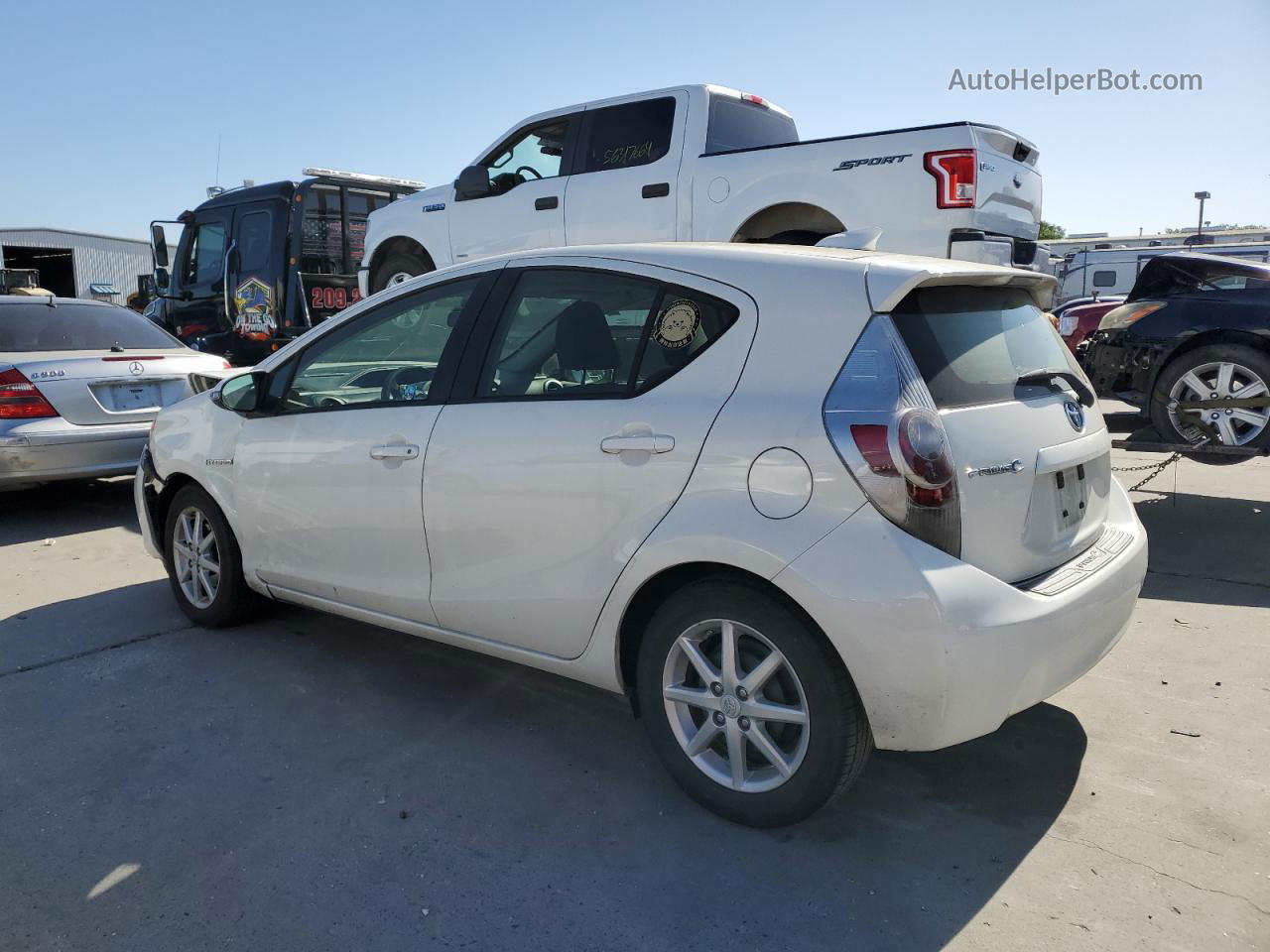 2014 Toyota Prius C  White vin: JTDKDTB39E1074234