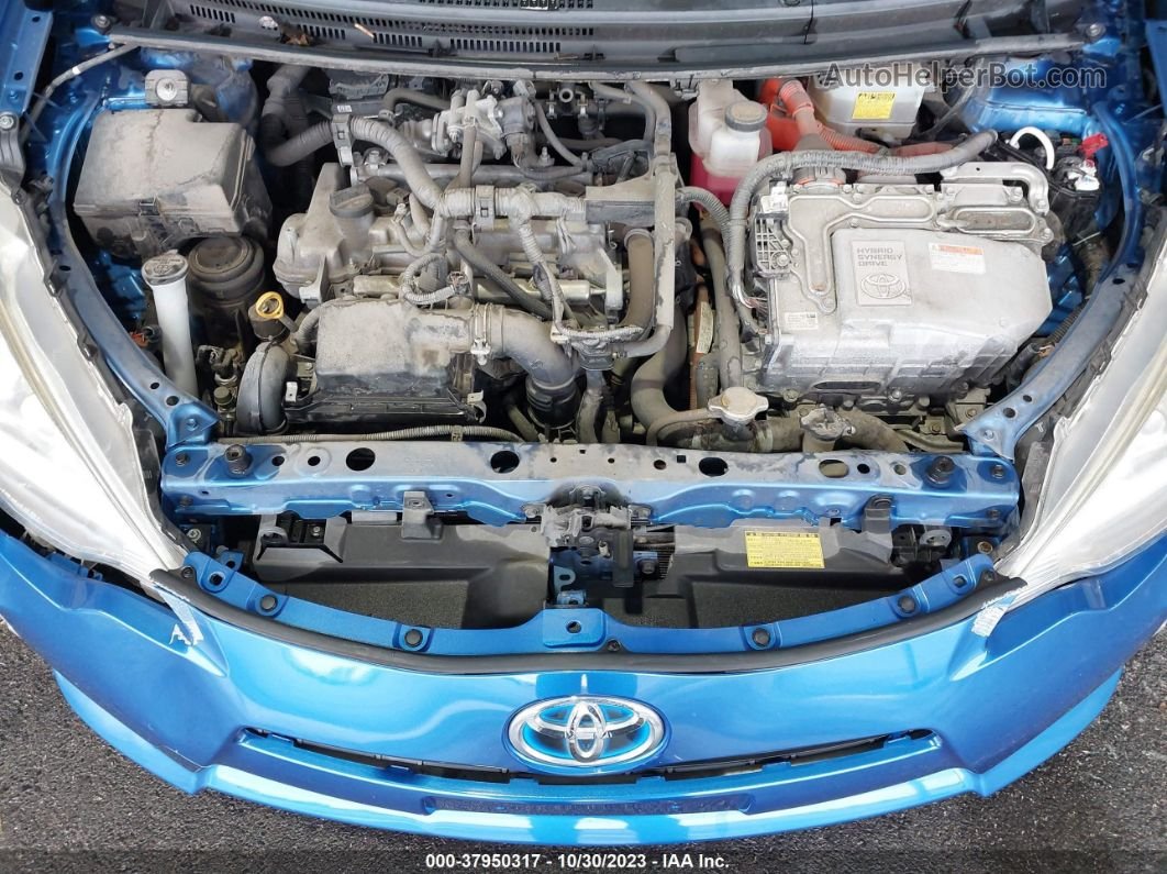 2014 Toyota Prius C Four Синий vin: JTDKDTB39E1565189